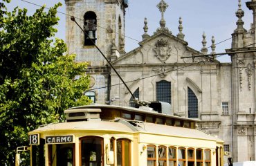 tram in front of Carmo Church, Porto, Portugal